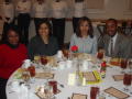 Photograph: [Guests seated around table at 2005 Black History Month]