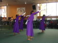 Photograph: [Dancers in purple dresses at One O'Clock Lounge]