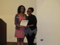 Photograph: [Cara Walker and DaNeetra Kersee holding certificate]