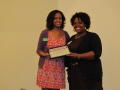 Photograph: [Cara Walker and Raven Dickerson with certificate]