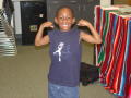 Primary view of [Boy flexing muscles]
