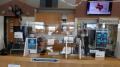 Primary view of [Library employees at front desk of East Arlington Public Library]