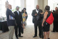 Primary view of [People mingling in hallway at 2012 TABPHE conference]