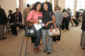 Primary view of [Two women at 2012 TABPHE conference]
