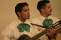 Photograph: [Mariachi guitarists at 2004 La Raza event]