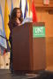 Photograph: [Woman speaking at 2013 La Raza ceremony]