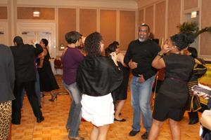 Primary view of object titled '[People dancing at 2012 TABPHE conference celebration 3]'.