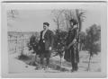 Primary view of [A girl and boy standing outdoors]