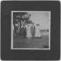 Photograph: [Two men and two women standing outdoors]