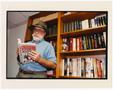 Photograph: [Portrait of Jim Marrs with his book]