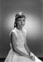 Photograph: [Portrait of young Carol with bangs]