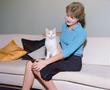 Photograph: [Portrait of Carol with a cat]