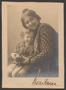 Photograph: [Photograph of woman and child]