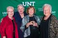 Photograph: [Four women posing together at the UNT College of Music Gala]