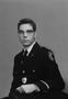 Photograph: [Portrait of Richard F. Milwee in his McCallie School uniform, holdin…