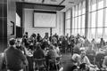 Photograph: [People seated at tables at College of Music Faculty and Staff Retrea…