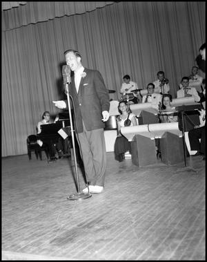 Primary view of object titled '[Pat Boone performing onstage]'.