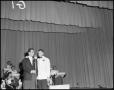 Photograph: [Pat Boone & Floyd "Fessor" Graham performing onstage]