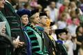 Photograph: [Faculty stands at UNT's 2008 graduation ceremony]