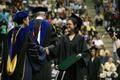 Photograph: [Student receives degree during UNT's 2008 graduation ceremony]