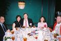 Photograph: [Family sits around table at 109th TXSSAR Annual State Convention]