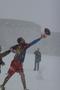 Photograph: [Men play football in the snow, 2]