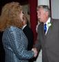 Photograph: [Steven Fromholz shakes woman's hand at Poet Laureate ceremony]