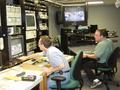 Photograph: [CMP staff in production control room, view from left, 2]