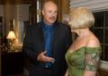 Photograph: [Gretchen Bataille and Dr. Phil converse at inauguration reception]