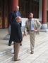 Primary view of [Thomas Evenson and Warren Burggren with man during UNT delegation visit to China]