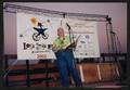 Photograph: [Janie Bush speaking at opening ceremonies: Lone Star Ride 2002 event…