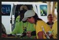 Photograph: [Crew members in line for food: Lone Star Ride 2002 event photo]