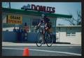 Photograph: [Dandy Donuts cyclist: Lone Star Ride 2002 event photo]
