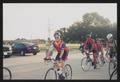 Photograph: [Cyclist in sunglasses and camera man: Lone Star Ride 2004 event phot…