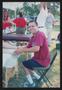 Photograph: [Individual giving a foot massage: Lone Star Ride 2004 event photo]
