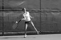 Photograph: [Lynley Wasson hits forehand during Stephen F. Austin match, 9]