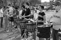 Photograph: [Percussion Ensemble students practice outside of Clark Hall, 2]