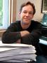 Photograph: [Jake Heggie with sheet music and piano, 2]