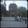 Photograph: [People and a statue at the National Museum of Anthropology]