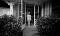 Photograph: [Derrick Williams standing in a doorway]