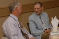 Photograph: [Stan Ingman and Hiram Friedsam converse at 2006 SVCI Luncheon]