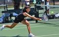 Photograph: [Nadia Lee hits forehand during FIU match, 3]