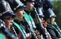 Primary view of [Green Brigade clarinet players perform at 2012 Homecoming Parade]