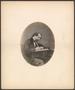 Photograph: [Photograph of Charles Dickens writing at a desk]