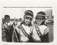 Photograph: [Two members of the Quinlan Ford High School marching band]
