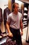 Primary view of [Mike Modano browsing men's shop for a suit]