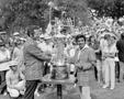 Photograph: [Rod Curl and another man posing with a large trophy]