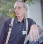 Photograph: [Close up of professor Peter Feresten with his pet bird, 2]