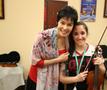 Primary view of [Julia Bushkova with 2014 Summer String Institute student]