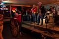 Photograph: [Cowboys performing in bar]